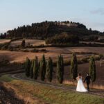 couples in tuscan path